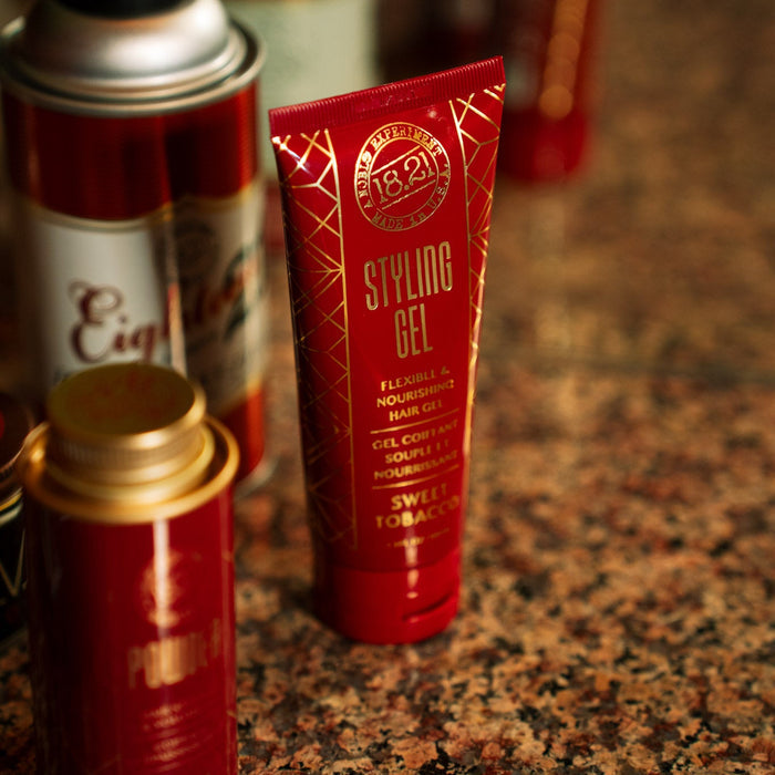 styling gel with hair powder and hairspray on countertop