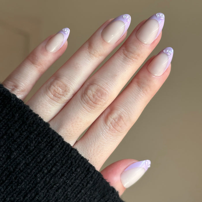 3D Iridescent Petal - Press-On | Medium | Almond nails with lavender french tips and 3D petal accents for easy at-home manicure
