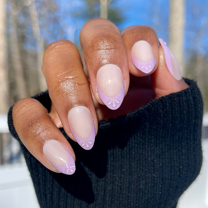 3D Iridescent Petal - Press-On | Medium | Almond nails with lavender french tips and delicate 3D petal accents for easy at-home manicure