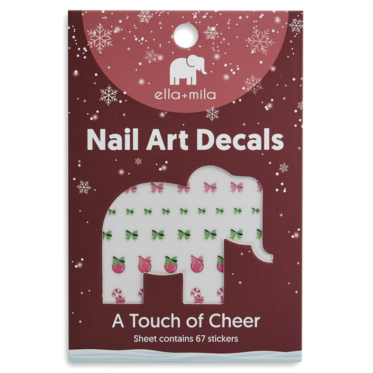 A Touch of Cheer holiday nail art decals in festive red packaging – ella+mila