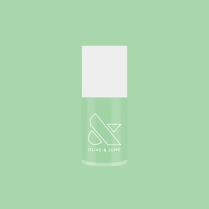 Bottle of Olive and June Aced It nail polish in cool pastel green for quick-dry and long-lasting mani looks