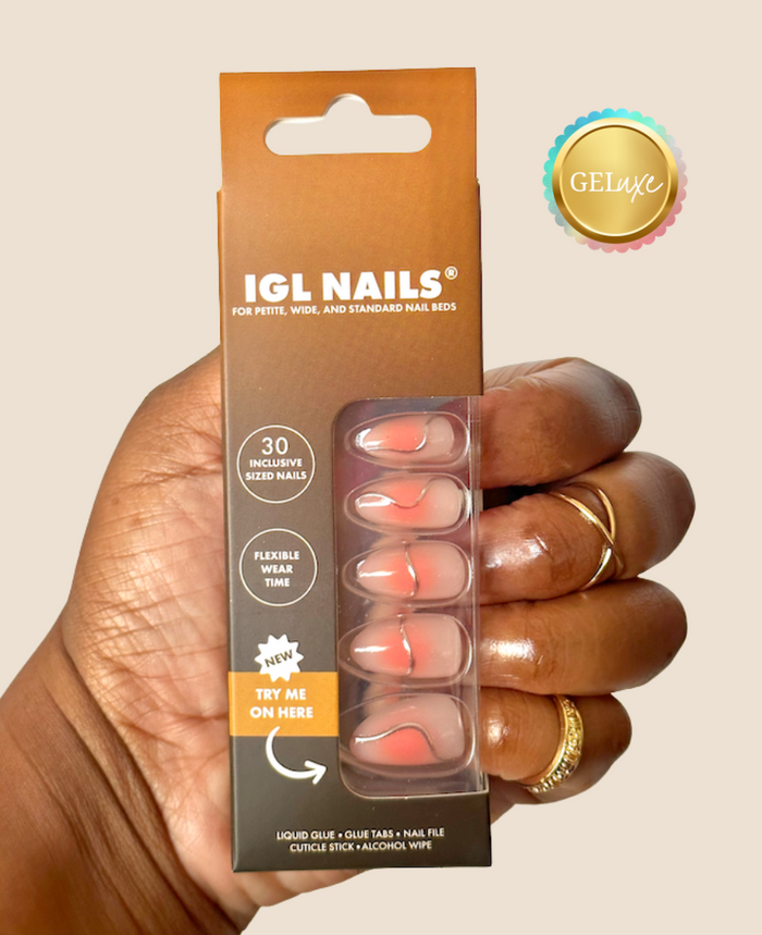 Birdie Geluxe press-on nails with coral aura base and 3D silver chrome abstract design. Short almond shape, size-inclusive for all nail beds.