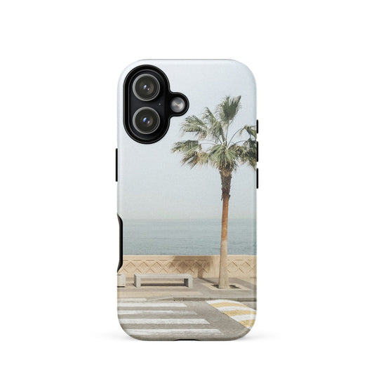 Phone case with palm tree and beach design on a white background
