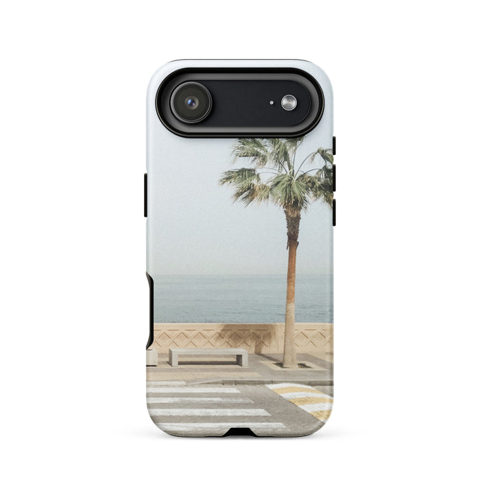 Phone case with a palm tree and beach design on a white background