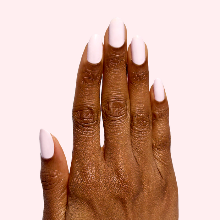 Brave Blush pastel pink nail polish on natural nails with a smooth, glossy finish for an easy at-home manicure