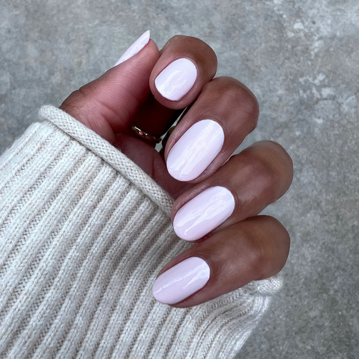 Brave Blush pastel pink nails with a glossy finish on natural nails for a smooth, long-lasting at-home manicure