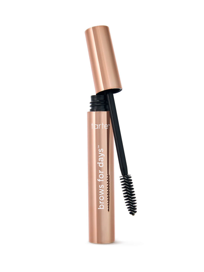 Tarte brow product with black bristle brush on a white background