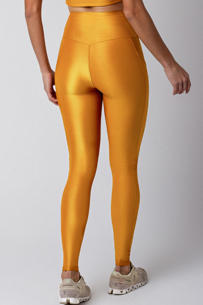 Calça Thay Bolsos Laterais - Dourada