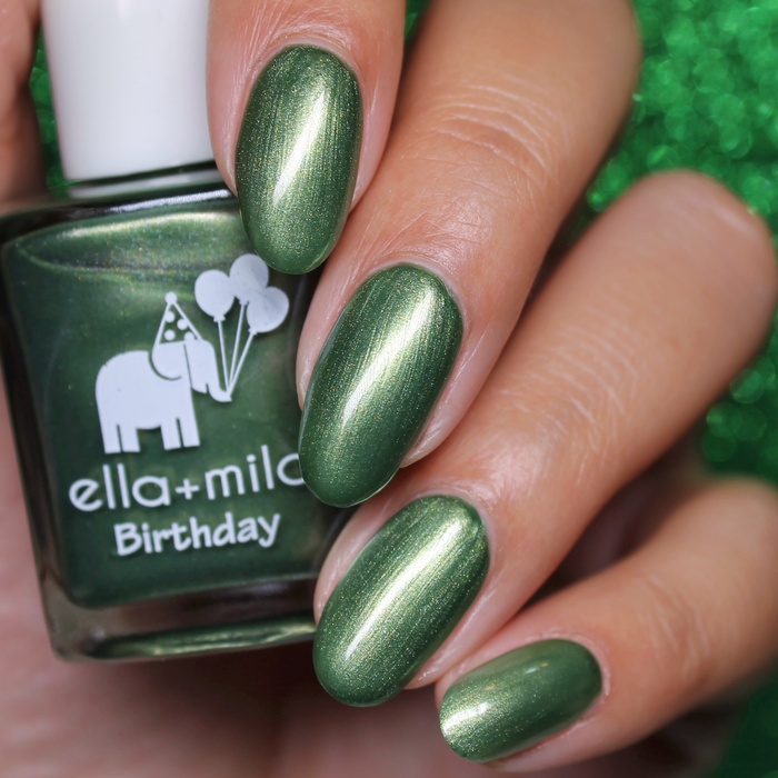 Call Me Jade sage green shimmer nail polish close-up with the bottle