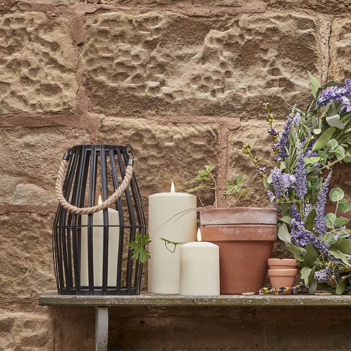LA20018_canberra-slatted-outdoor-lantern-with-truglow-candle-garden.jpg