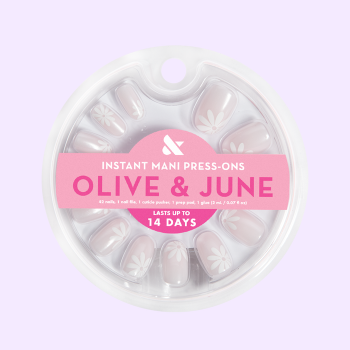 Chrome Daisy Pop - Press-On | Short | Round featuring short round neutral press-on nails with chrome daisy accents for easy mani