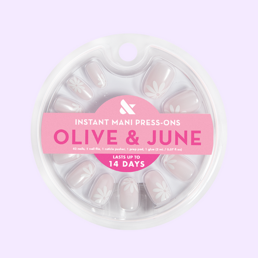 Chrome Daisy Pop - Press-On | Short | Round featuring short round neutral press-on nails with chrome daisy accents for easy mani