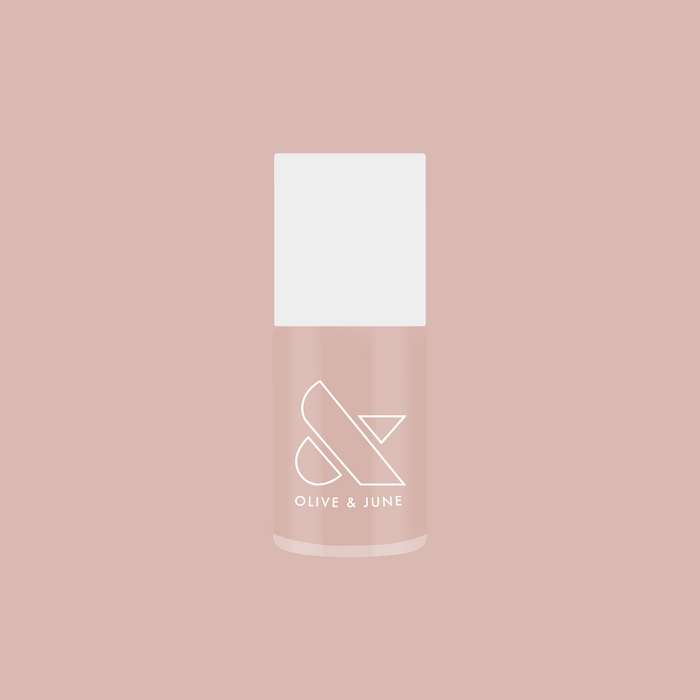 bottle of cold foam pls nail polish in soft neutral beige with subtle shimmer for elegant at home manicure