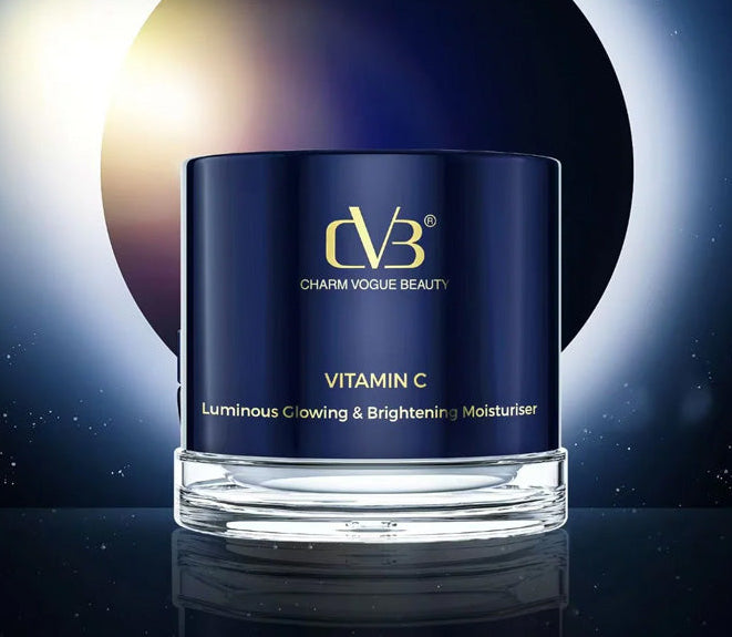 Cosmetic jar labeled 'Vitamin C' with 'Charm Vogue Beauty' branding on a dark background.