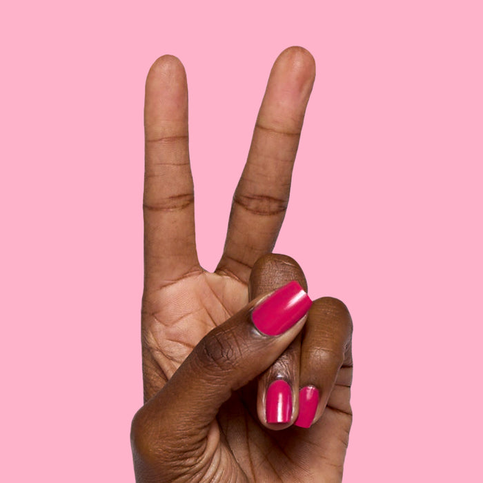 Diner Date vibrant hot pink gel polish on short nails with a smooth glossy finish for a quick at-home manicure