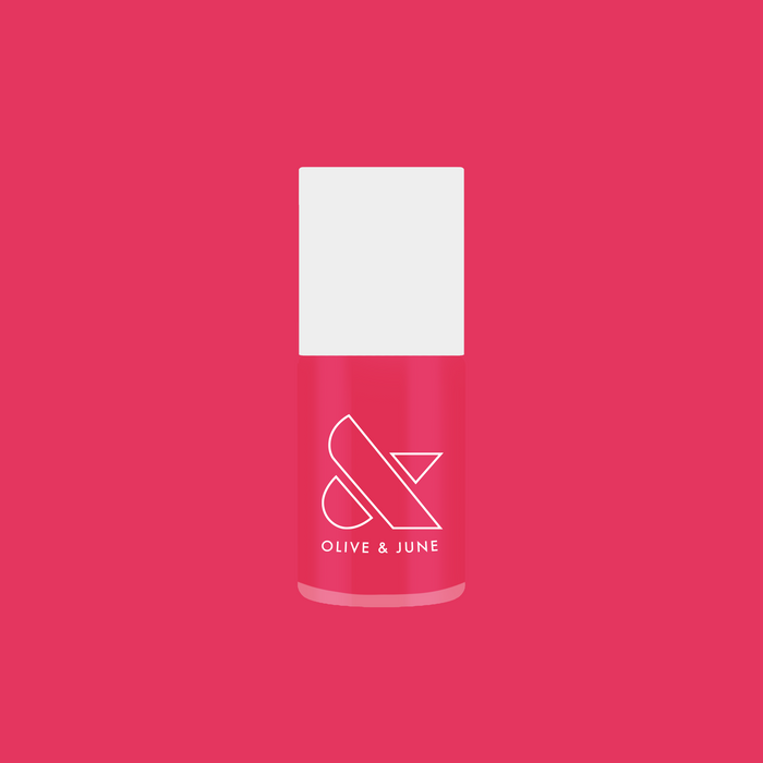 Diner Date bright hot pink nail polish bottle on matching background for a vibrant at-home manicure option