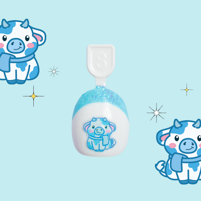 Fuzzy Winter Cow French - Pressies | Extra Short Short | Round showing blue and white false nail with cute cow design and glitter tip