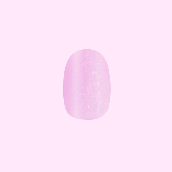 Glitter Cowgirl - Press-On | Short | Round milky lavender false nail with holographic flakes for easy at-home mani