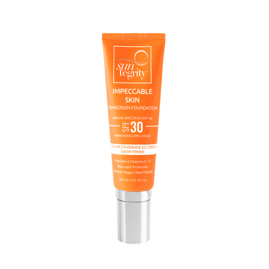 A bright orange tube of Suntegrity Impeccable Skin Medium Coverage CC Cream foundation with SPF 30