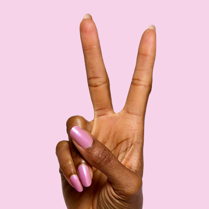 Island Time shimmery lilac gel polish on natural nails for a smooth, long-lasting at-home manicure by Olive and June