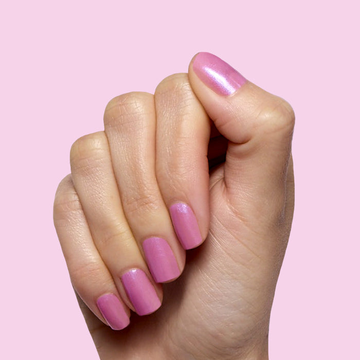 Island Time shimmery sheer lilac gel polish on natural nails for a smooth, long-lasting at-home manicure by Olive and June