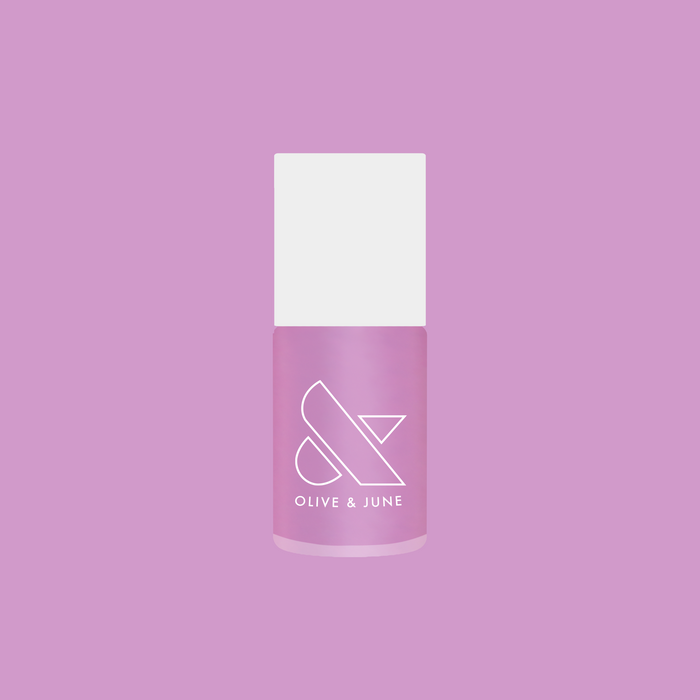 Island Time gel polish bottle by Olive and June in a shimmery sheer lilac shade for long-lasting at-home manicures