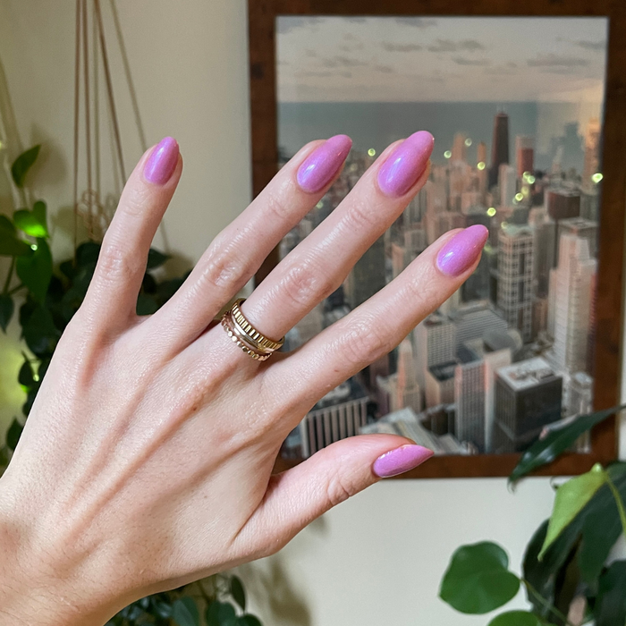 Island Time sheer lilac purple gel polish on natural nails with a smooth, shimmery finish for long-lasting at home manis