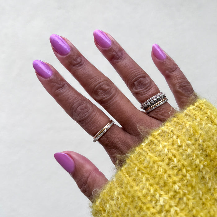 Island Time gel polish on natural nails in a subtle lilac shimmer for a smooth, long-lasting at-home manicure by Olive and June