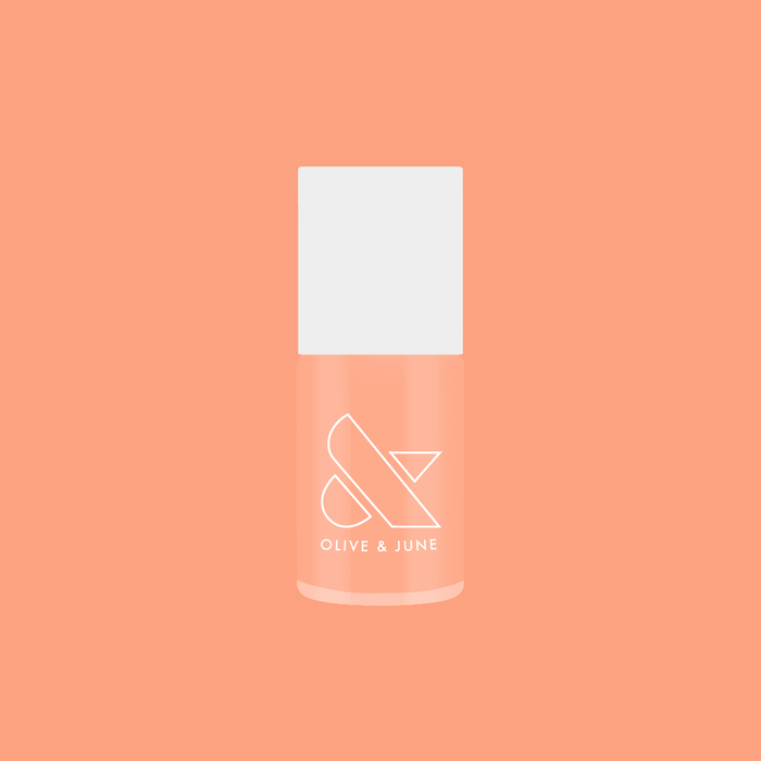 Bottle of It’s Serving Melon Cocktails nail polish in soft pastel melon shade for fresh, long-lasting at home manicure looks