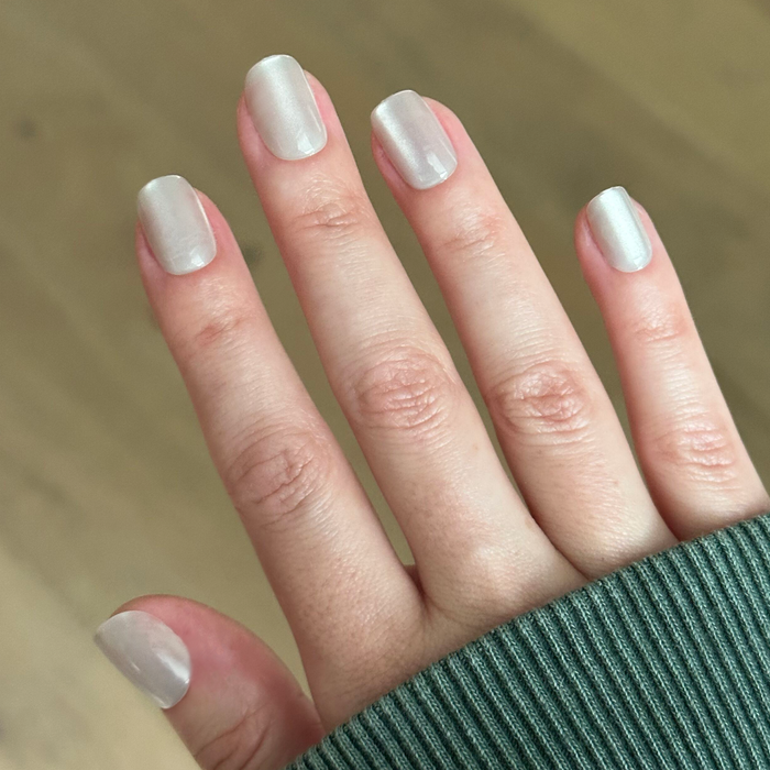 Marshmallow Velvet - Press-On | Extra Short | Squoval soft white velvet effect press-on nails on hand with natural light