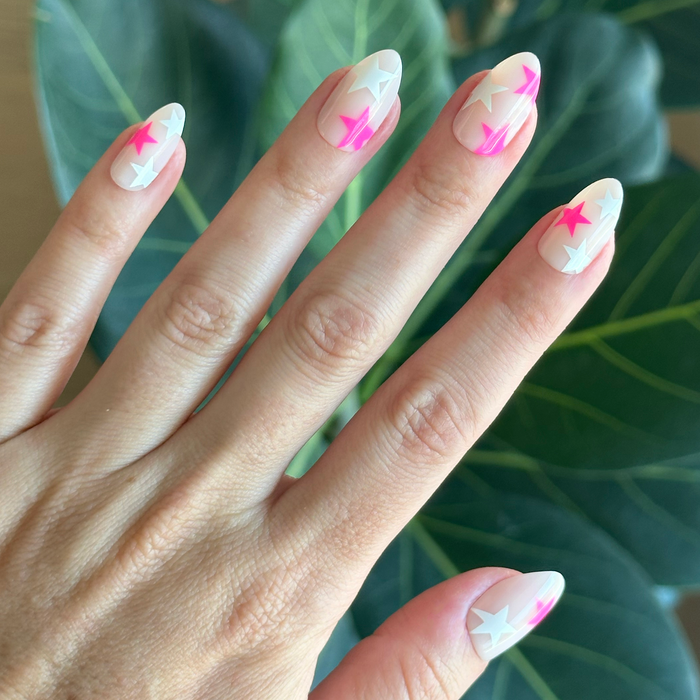 Neon Star Mixed Pack - Press-On | Medium | Almond with sheer base and white and neon pink star designs for mani