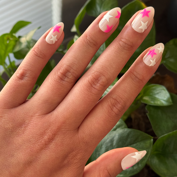 Neon Star Mixed Pack - Press-On | Medium | Almond with sheer nails featuring neon pink and white star designs for easy press-on mani