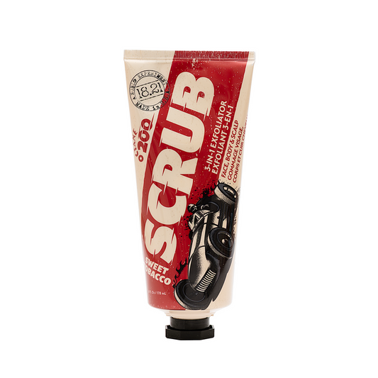 Tube of 3-in-1 scrub with red and beige packaging on a white background