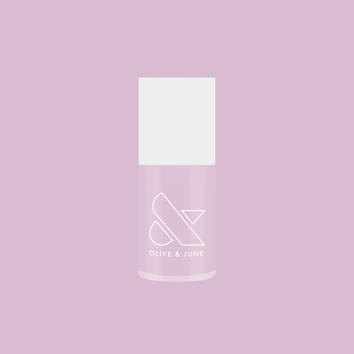 Bottle of Passionfruit Gloss quick dry gel polish in milky lavender shade on soft purple background