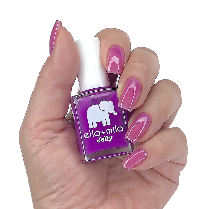 PB Jelly Time sheer purple jelly nail polish manicure on a light skin tone with the bottle