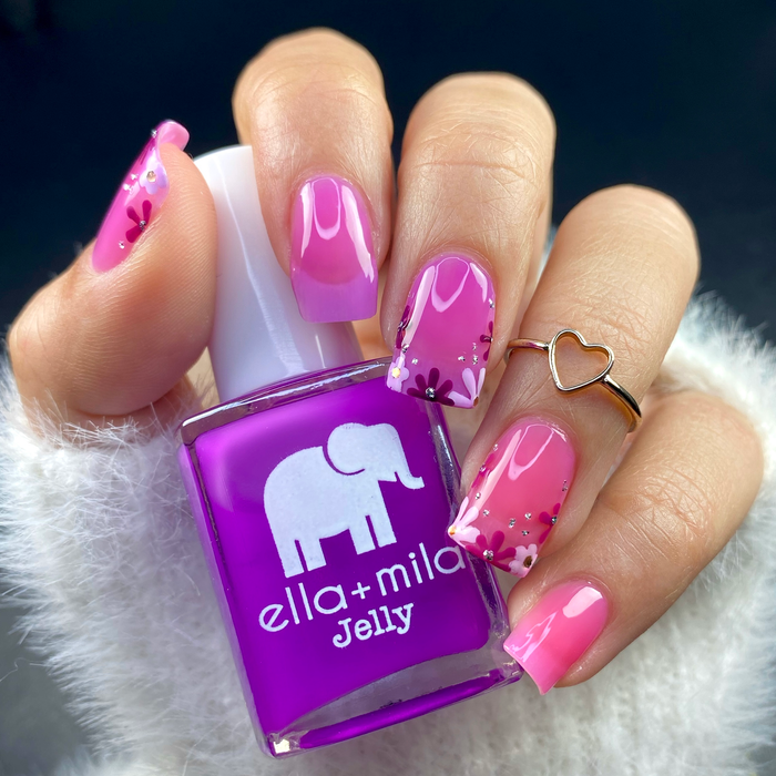 PB Jelly Time purple with pink jelly mix-and-match manicure, holding the bottle