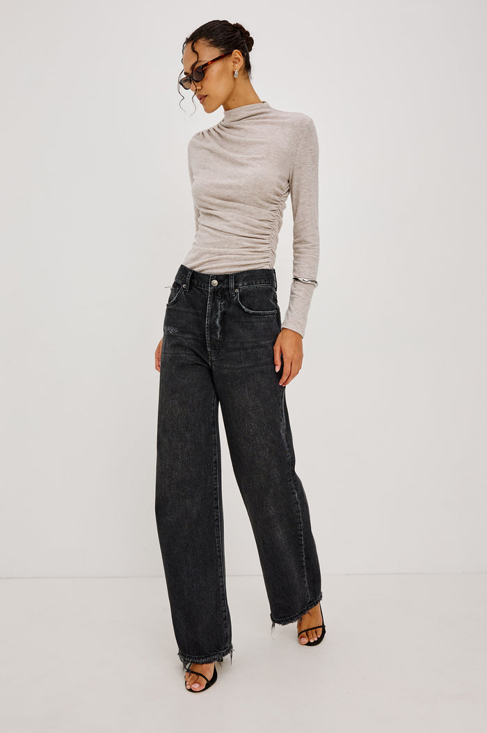 Belmont Petite Arc Leg Jean in Rigid Denim With High Rise, Distressed Detailing, Button Fly, and 5-Pockets in Nightcap Colorway - Full Body Front View Featured on Model