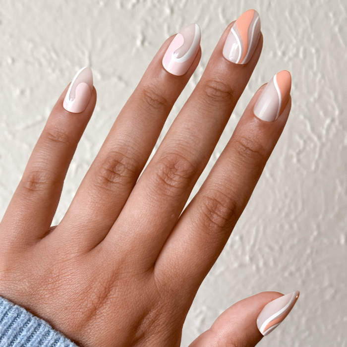 Pink Swirl Mixed Pack - Press-On | Medium | Almond showing neutral base with soft pink and peach swirls for an easy at-home mani