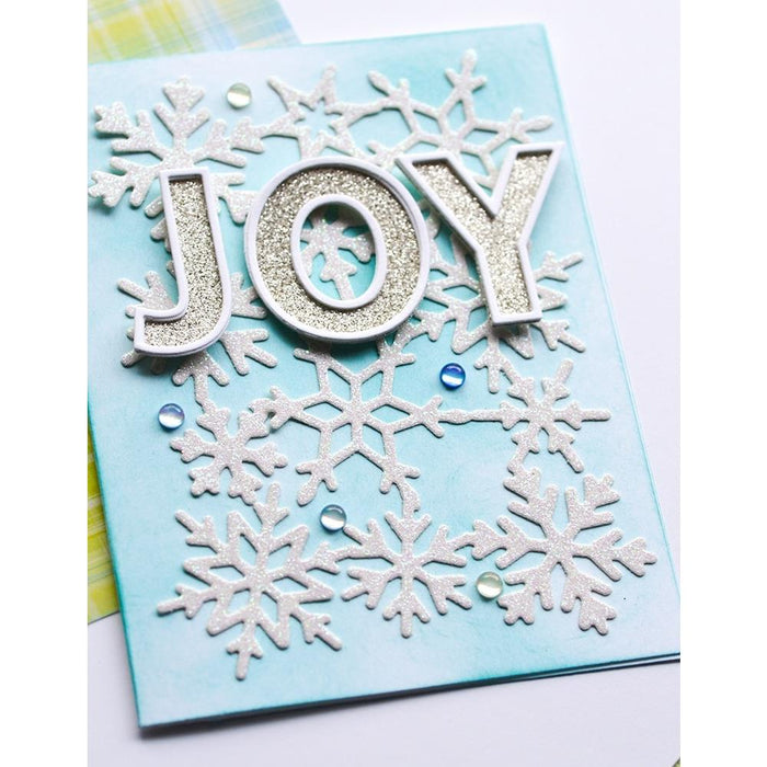 Poppystamps - Metal Die - Snowflake Background. Available at Embellish Away located in Bowmanville Ontario Canada.