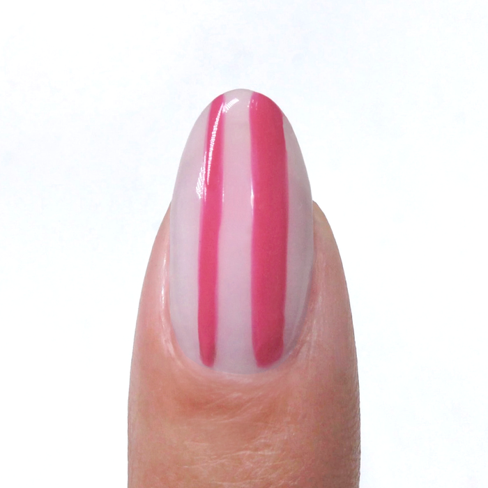 Portrait Pink liner used for pink vertical stripes on a sheer nude nail