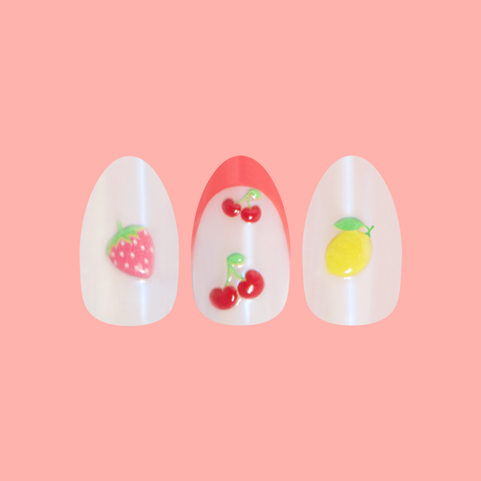 Puffy Fruits - Press-On | Medium | Oval featuring iridescent nails with 3D strawberry, cherry, and lemon designs for at-home mani
