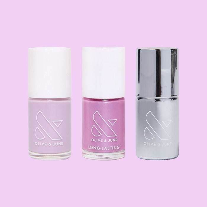 Purple Season set featuring purple and lavender nail polishes and silver topcoat for long-lasting at home manicures by Olive and June