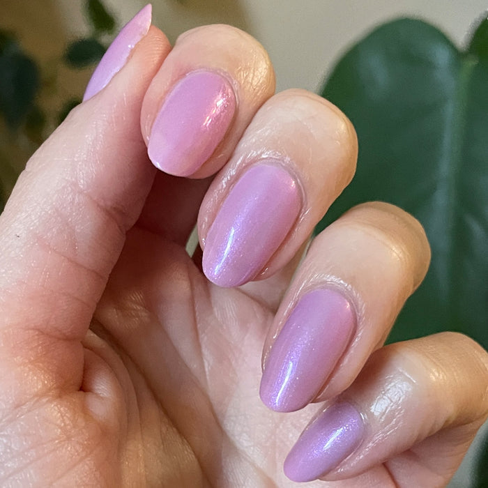 Purple Season layered manicure with glossy, soft purple polish on natural nails for a smooth, long-lasting at home mani