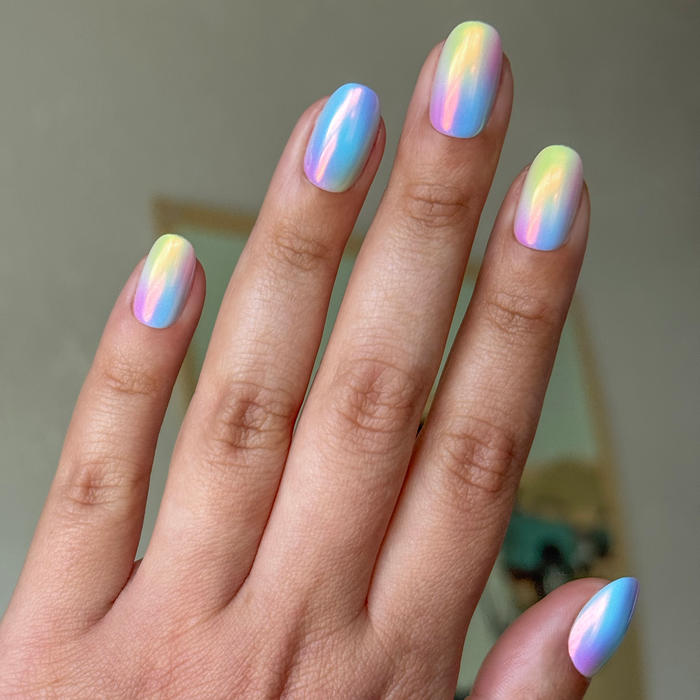 Rainbow Aura Chrome - Press-On | Short | Round soft rainbow gradient press-on nails on hand with indoor natural light
