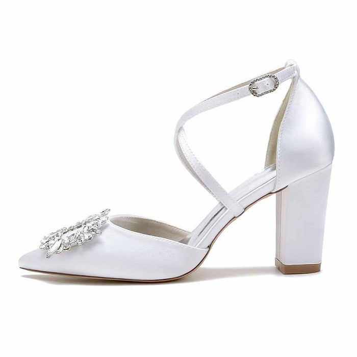 Elegant satin block heel bridal shoes with a sparkling embellishment for a chic wedding look