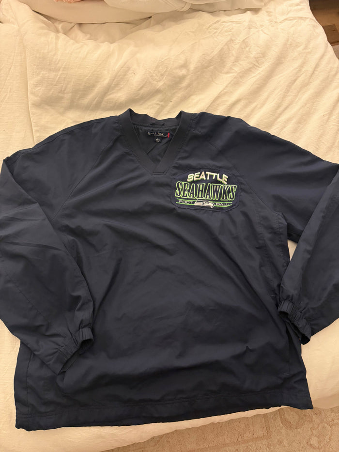Navy jacket with a Seahawks logo