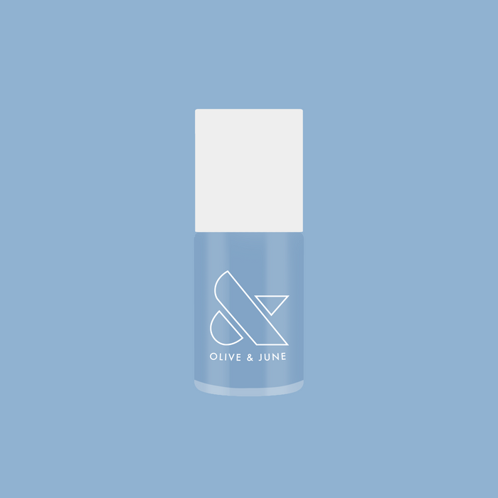 Olive and June gel polish bottle in Shades of Seersucker, a vibrant periwinkle blue for a fresh summer mani look