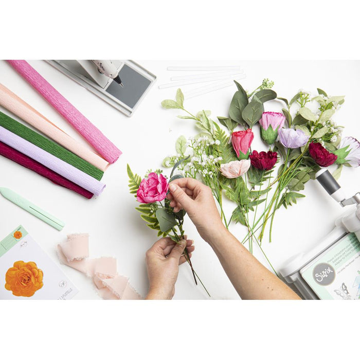 Sizzix - Thinlits Dies By Olivia Rose - 3/Pkg - Pom-Pom Flower. Create some floral fun with this Sizzix Pom-Pom Flower Thinlits Die Set! Use this simple rolling flower design to create a full bunch of wholesome blooms for that special someone. Available at Embellish Away located in Bowmanville Ontario Canada.