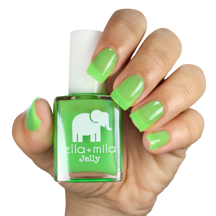 So Lime sheer green jelly nail polish manicure on a light skin tone with the bottle