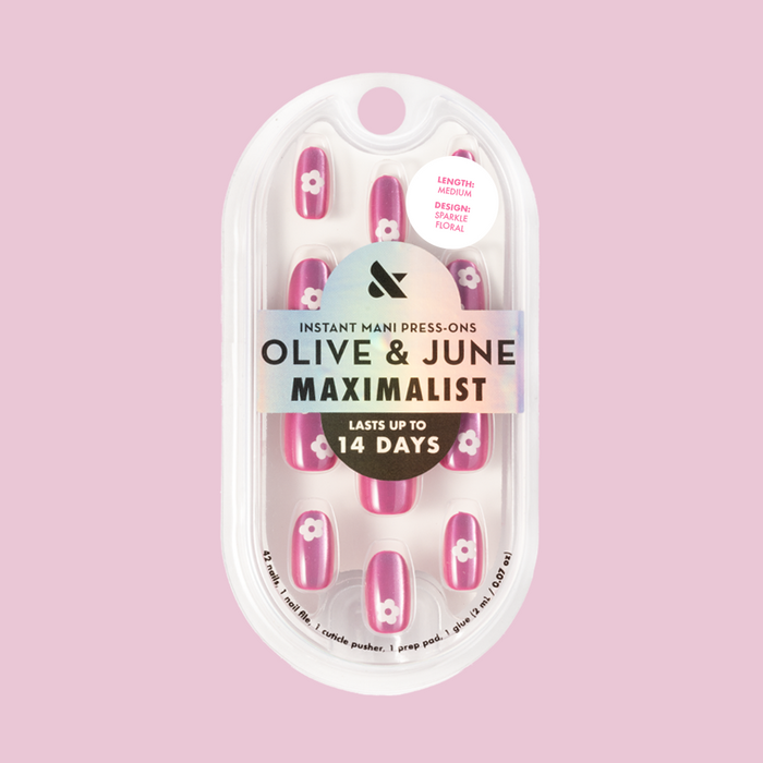 Sparkle Floral - Press-On | Medium | Oval nails with glittery pink base and white floral accents for a stylish mani look